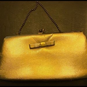 Used Gold Clutch.